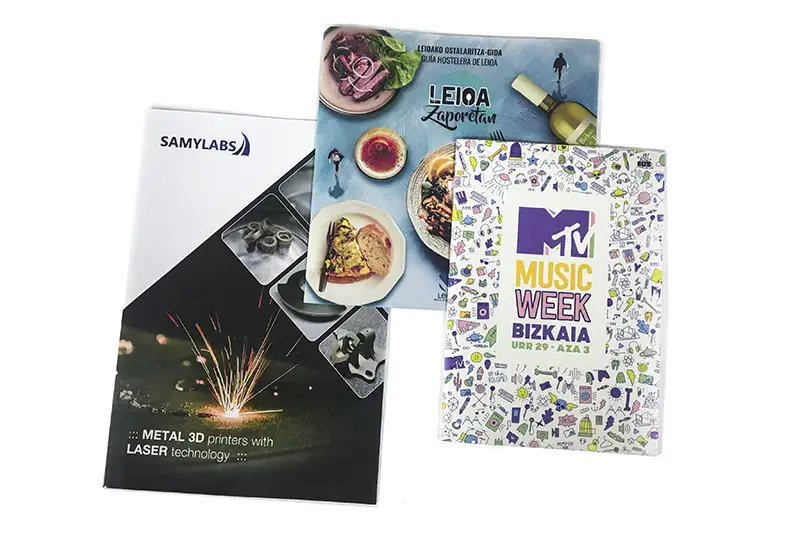 Impresión offset y digital de folletos: "Samylabs", "Leioa Zaporetan, guía de hostelería de Leioa" y "MTV Music Week Bizkaia" - Imprenta Vascograf, Arrigorriaga, Bizkaia